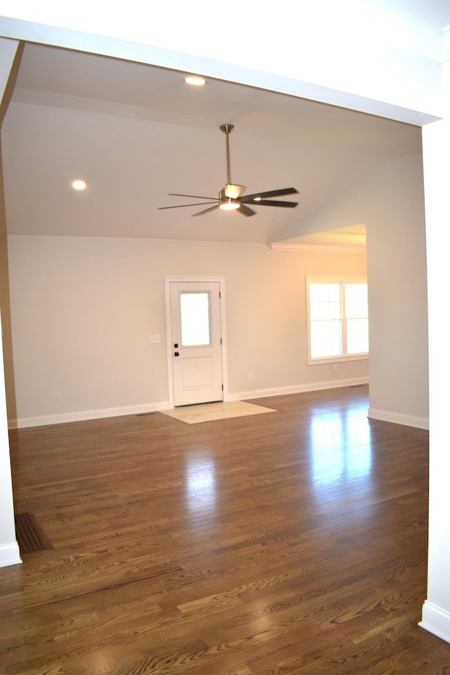 unfurnished room featuring recessed lighting, vaulted ceiling, dark wood-style flooring, baseboards, and a ceiling fan