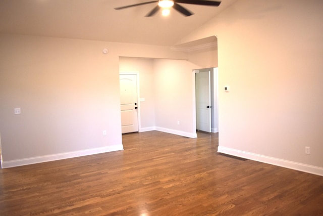 spare room featuring baseboards, high vaulted ceiling, ceiling fan, and dark wood-style flooring