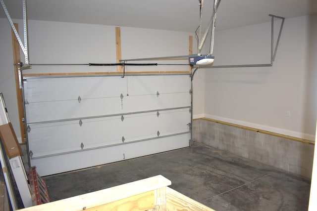 garage featuring a garage door opener
