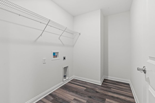 clothes washing area featuring washer hookup, dark wood-type flooring, electric dryer hookup, laundry area, and baseboards