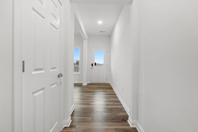 hallway featuring dark hardwood / wood-style floors