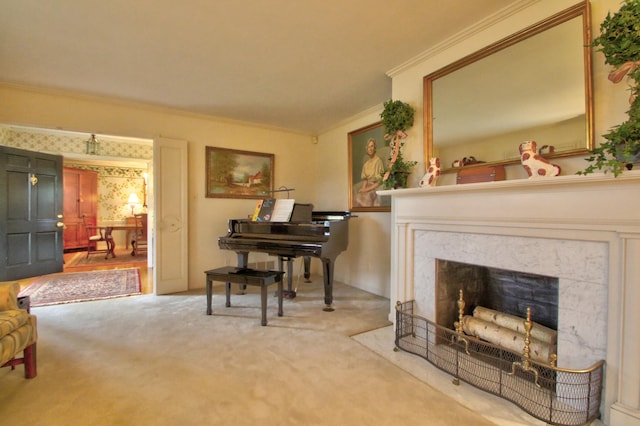 living area featuring light colored carpet, a premium fireplace, and ornamental molding