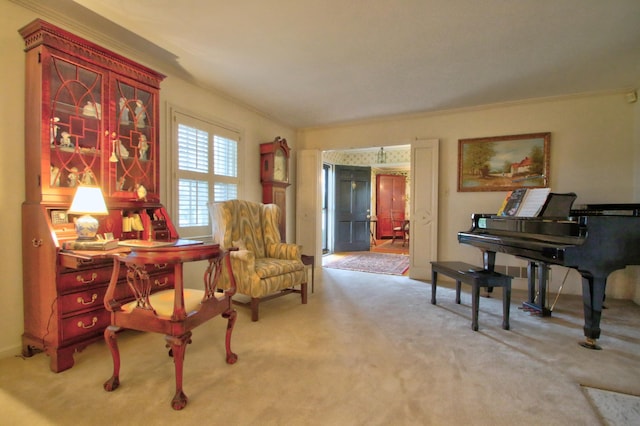 living area featuring light carpet and ornamental molding