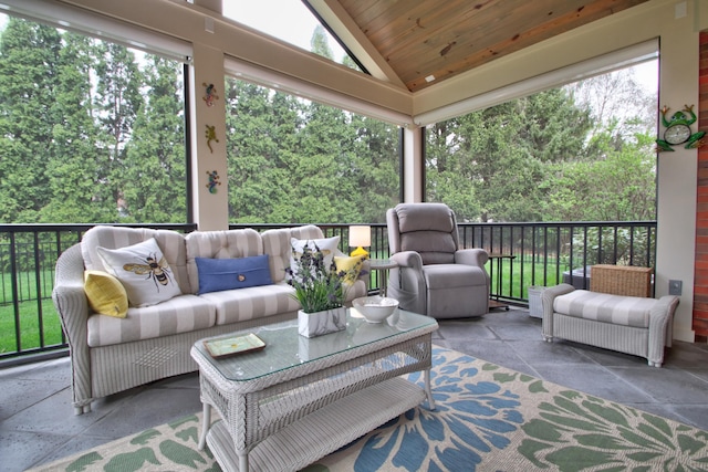 sunroom / solarium with wooden ceiling and lofted ceiling