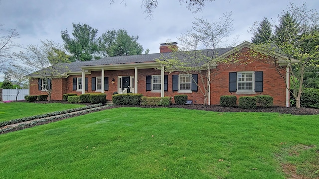 single story home with a front yard