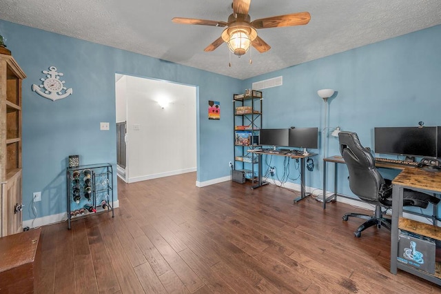 office area with hardwood / wood-style floors, a textured ceiling, and ceiling fan