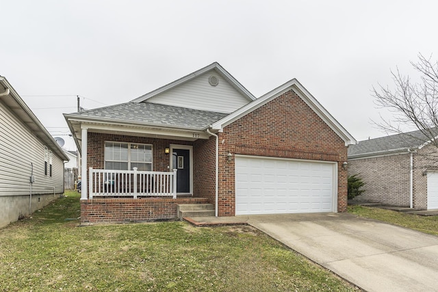 view of front of home featuring a garage, a front yard, and covered porch