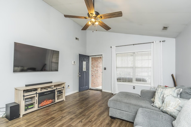 living room with vaulted ceiling, dark hardwood / wood-style floors, and ceiling fan