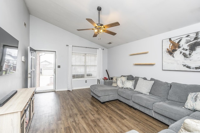 living room featuring dark wood-type flooring, ceiling fan, and lofted ceiling