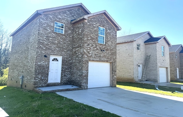 view of front property with a garage and a front yard