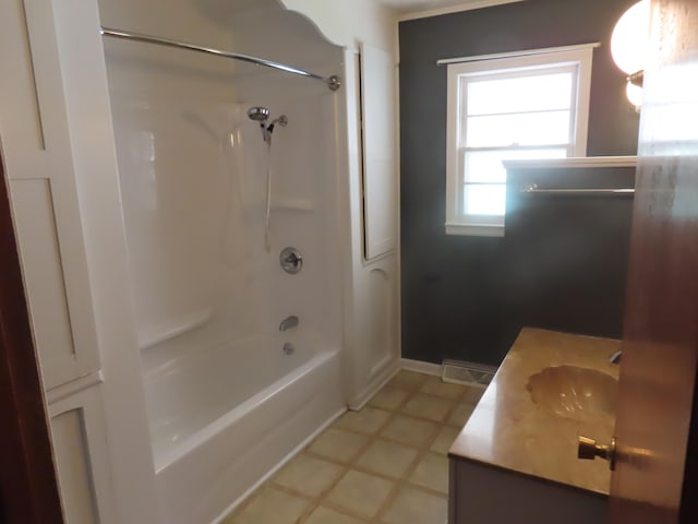 bathroom with shower / tub combination and vanity