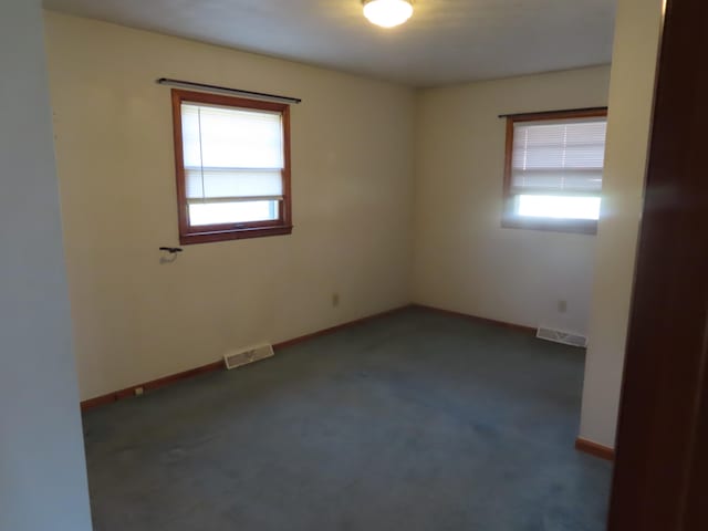 view of carpeted spare room