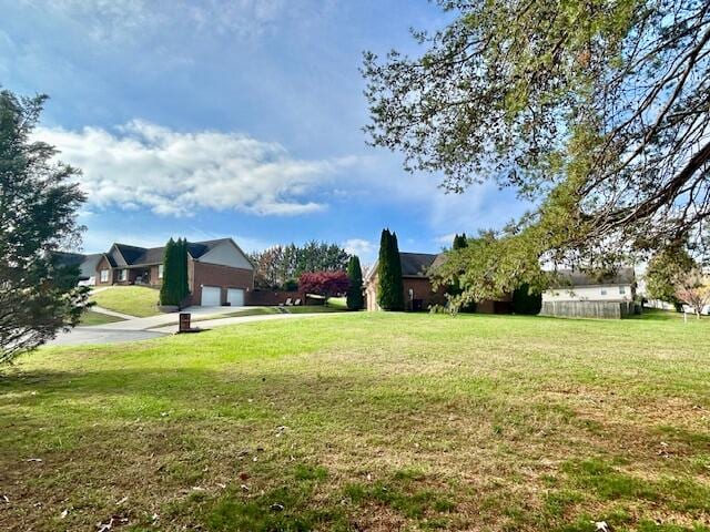 151 Surrounding Hills Dr, Somerset, KY 42503 - view of yard with a garage