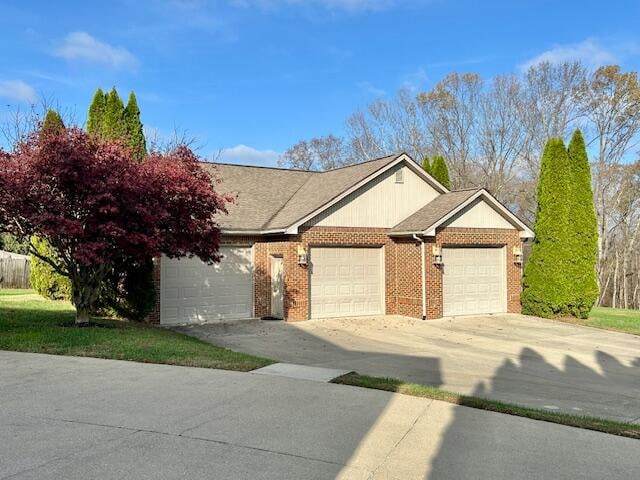 151 Surrounding Hills Dr, Somerset, KY 42503 - view of front facade with a garage