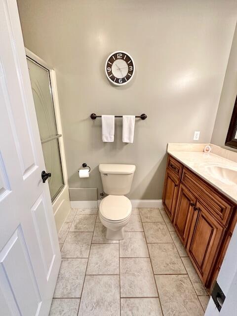 151 Surrounding Hills Dr, Somerset, KY 42503 - full bathroom with tile patterned floors, vanity, toilet, and bath / shower combo with glass door