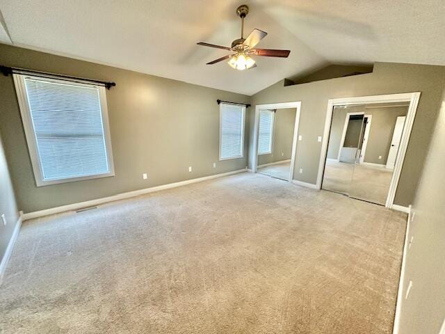151 Surrounding Hills Dr, Somerset, KY 42503 - unfurnished bedroom with light colored carpet, ceiling fan, and lofted ceiling