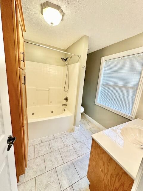 151 Surrounding Hills Dr, Somerset, KY 42503 - full bathroom featuring a textured ceiling, shower / washtub combination, sink, tile patterned flooring, and toilet