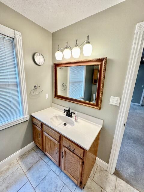 151 Surrounding Hills Dr, Somerset, KY 42503 - bathroom featuring tile patterned floors, vanity, and a textured ceiling