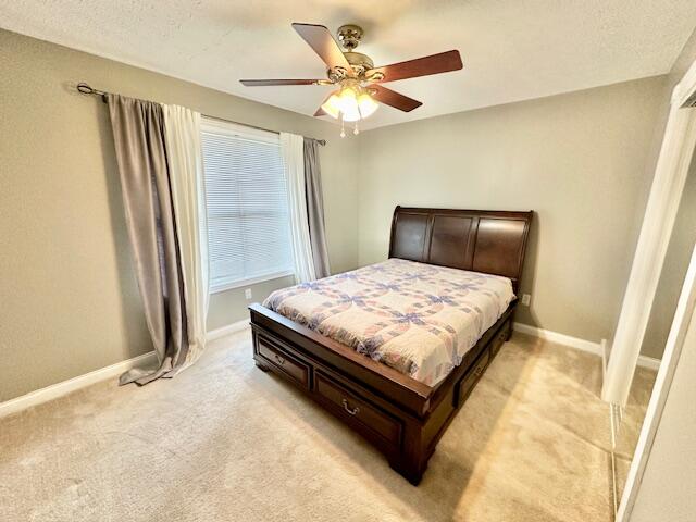 151 Surrounding Hills Dr, Somerset, KY 42503 - bedroom with ceiling fan and light colored carpet