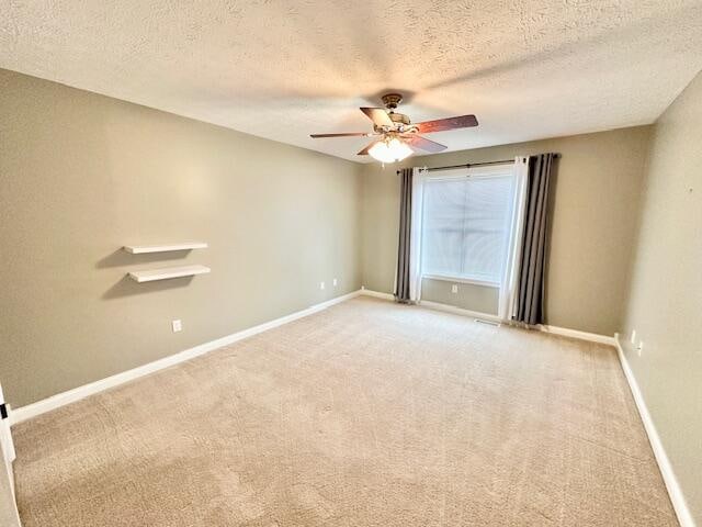 151 Surrounding Hills Dr, Somerset, KY 42503 - carpeted spare room with ceiling fan and a textured ceiling