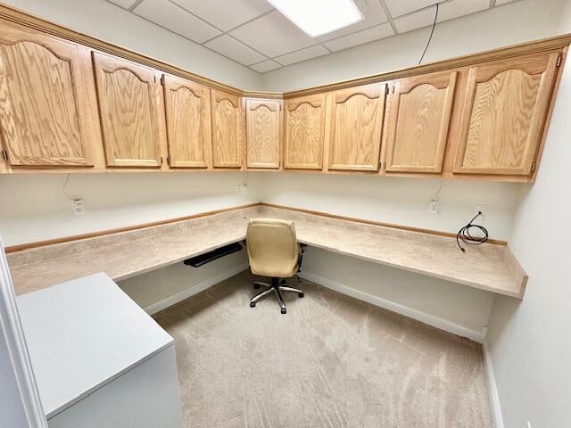 151 Surrounding Hills Dr, Somerset, KY 42503 - unfurnished office with light carpet, built in desk, and a paneled ceiling