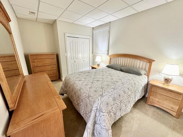 151 Surrounding Hills Dr, Somerset, KY 42503 - bedroom featuring a paneled ceiling, light carpet, and a closet