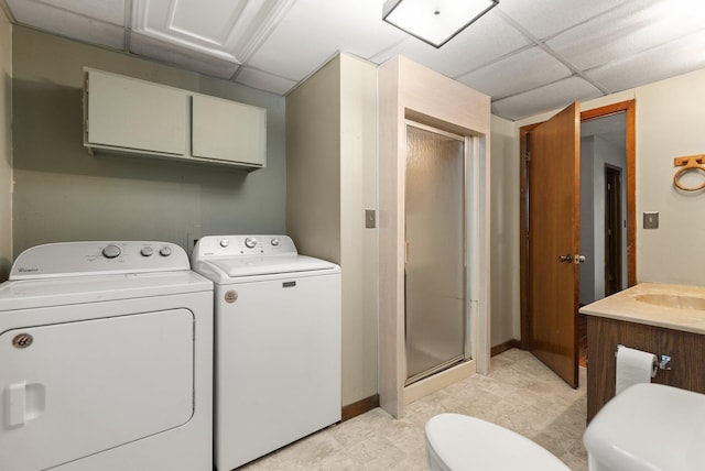 laundry room featuring washing machine and clothes dryer