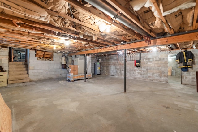 basement with water heater and heating unit