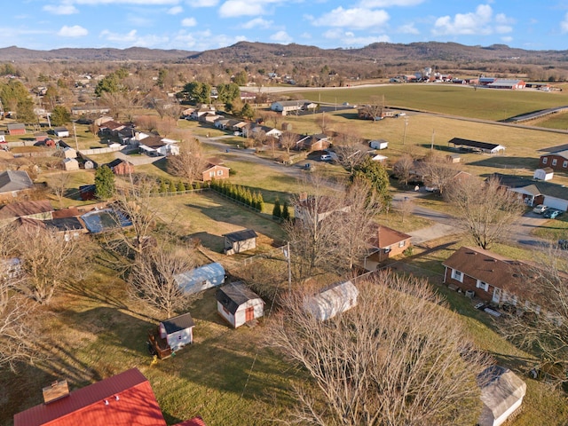 drone / aerial view featuring a mountain view