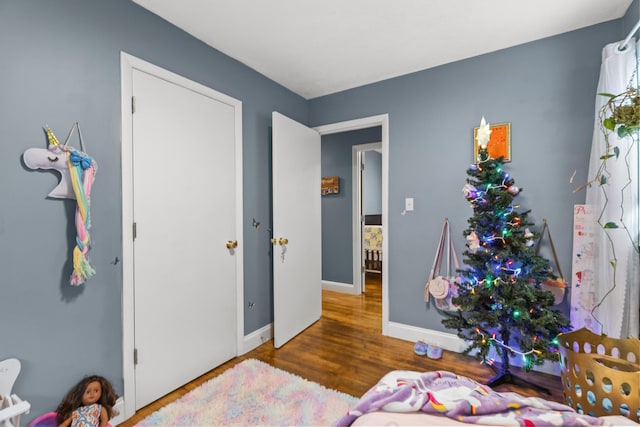 bedroom featuring hardwood / wood-style floors