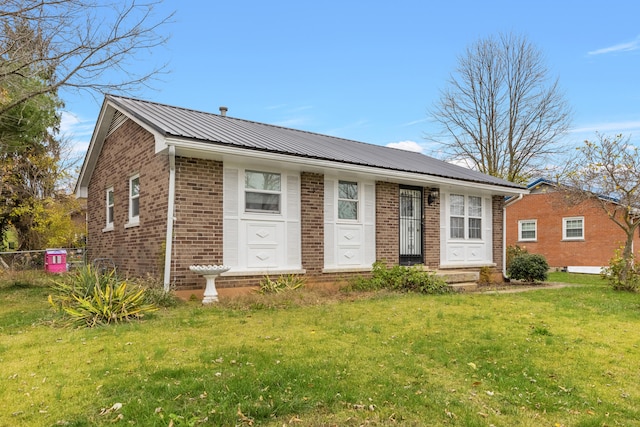 ranch-style home with a front yard