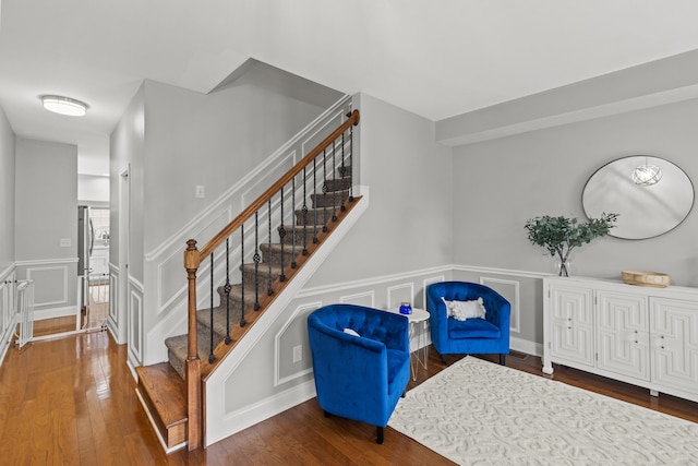 staircase featuring hardwood / wood-style floors