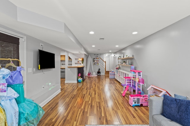 game room featuring hardwood / wood-style floors