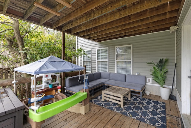 wooden deck featuring an outdoor hangout area