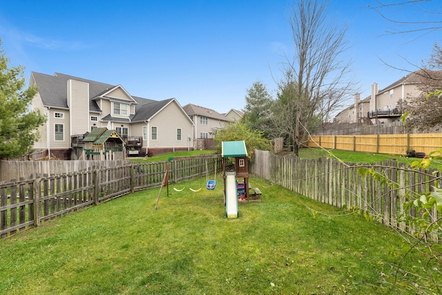 view of yard with a playground