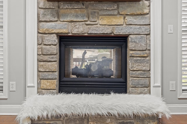 interior details featuring a fireplace