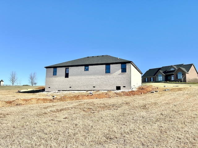 view of home's exterior with crawl space