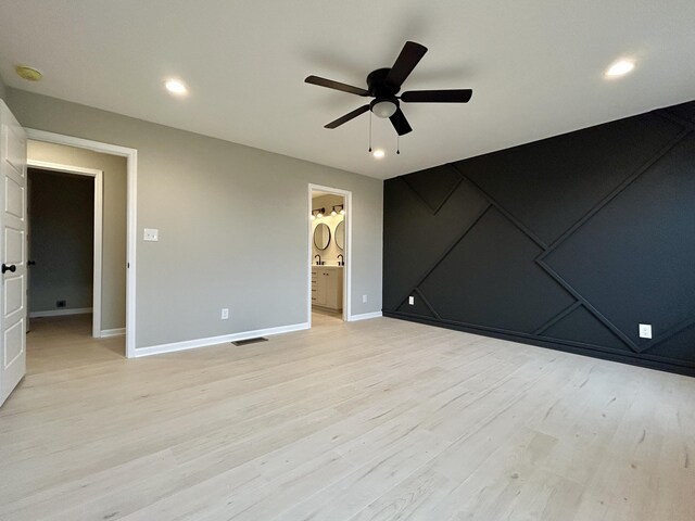 empty room with recessed lighting, visible vents, a ceiling fan, wood finished floors, and baseboards