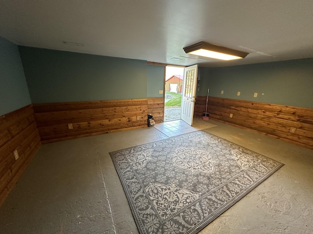 bonus room with wooden walls