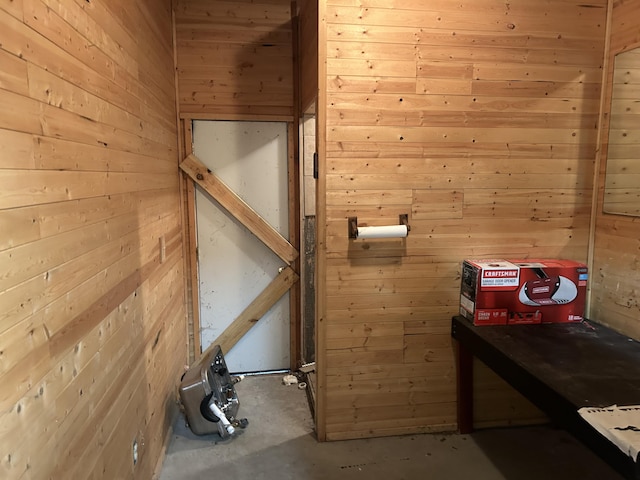 view of sauna featuring concrete floors