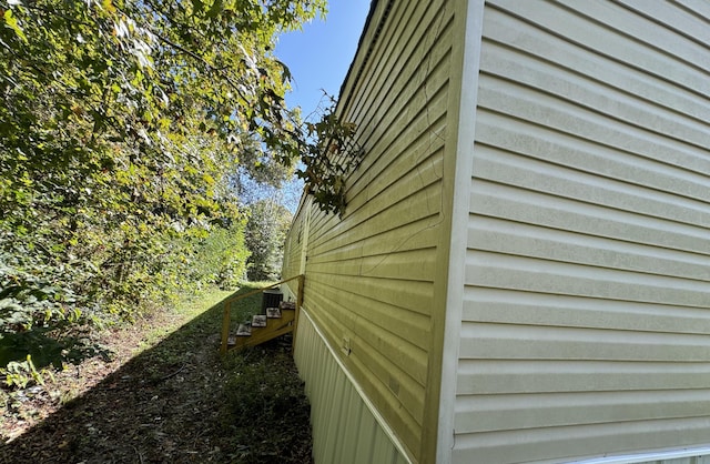 view of home's exterior featuring central air condition unit