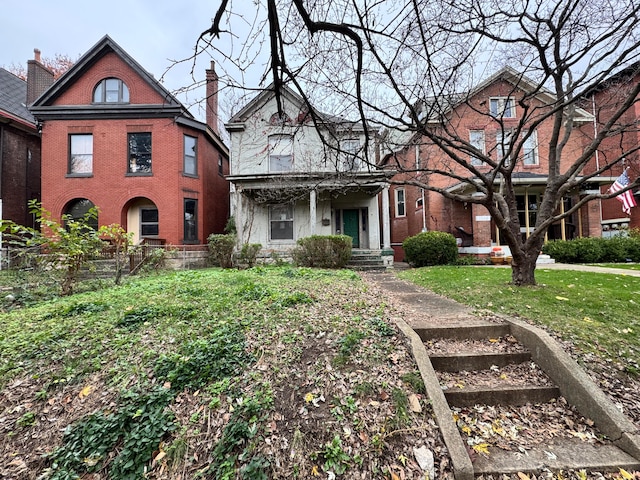 view of front of house with a front lawn