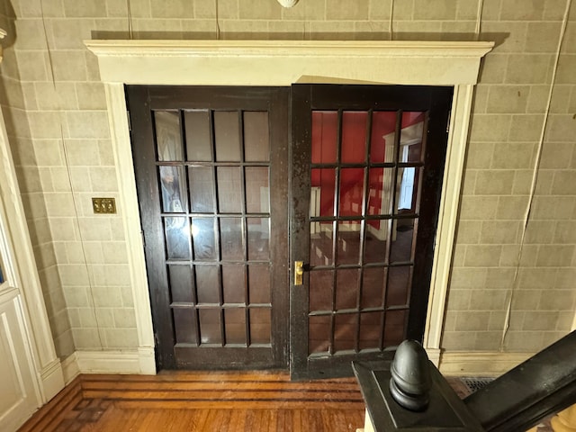 doorway featuring dark hardwood / wood-style flooring