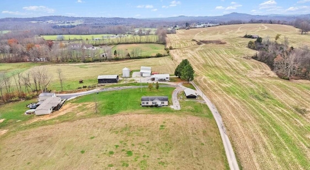 aerial view with a mountain view and a rural view