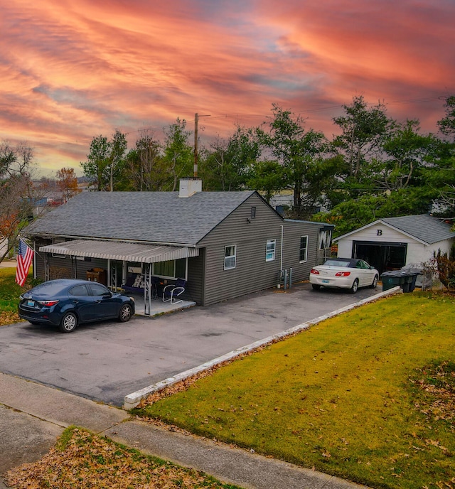 view of front of property with a yard