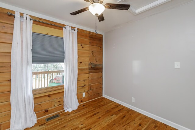 unfurnished bedroom with ceiling fan, dark hardwood / wood-style flooring, and a closet