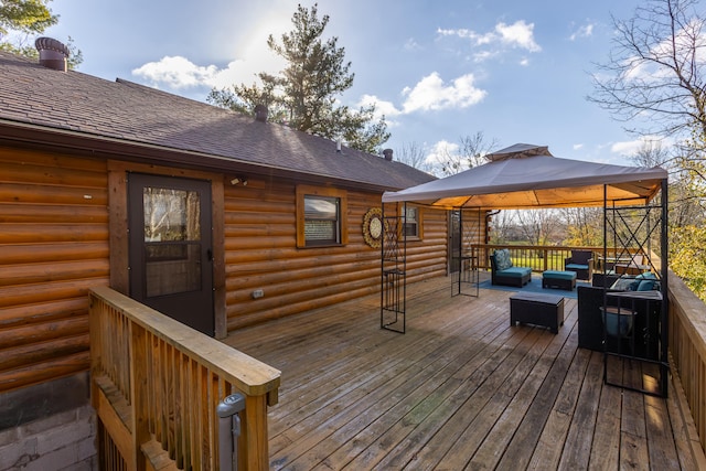 deck with a gazebo and an outdoor living space