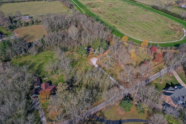 birds eye view of property featuring a rural view