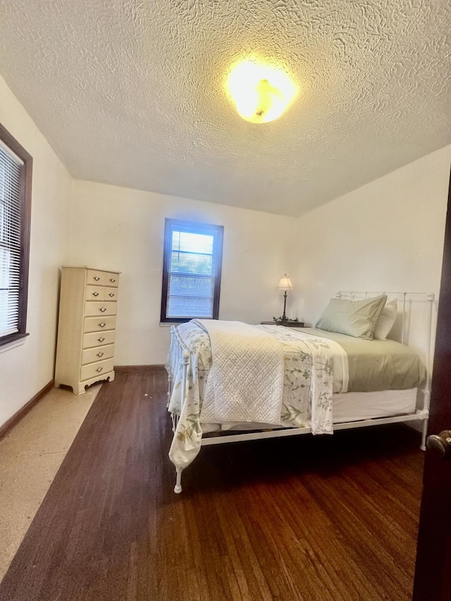 bedroom featuring a textured ceiling