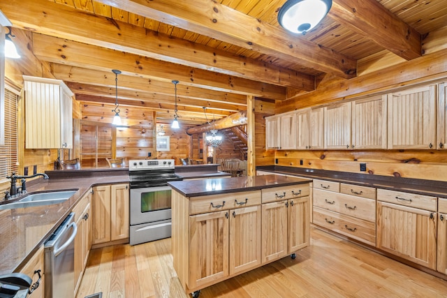 kitchen with sink, hanging light fixtures, light wood-type flooring, appliances with stainless steel finishes, and beamed ceiling